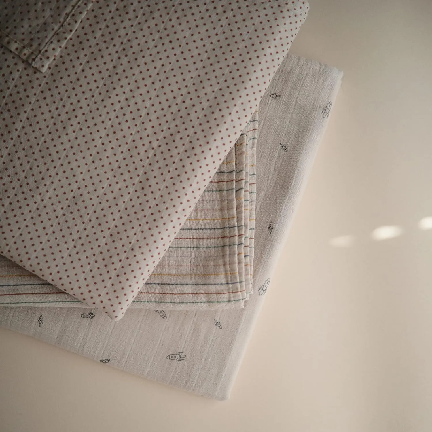 mushie Muslin Baby Swaddle Blanket | 100% Organic Cotton (Caramel Dots)